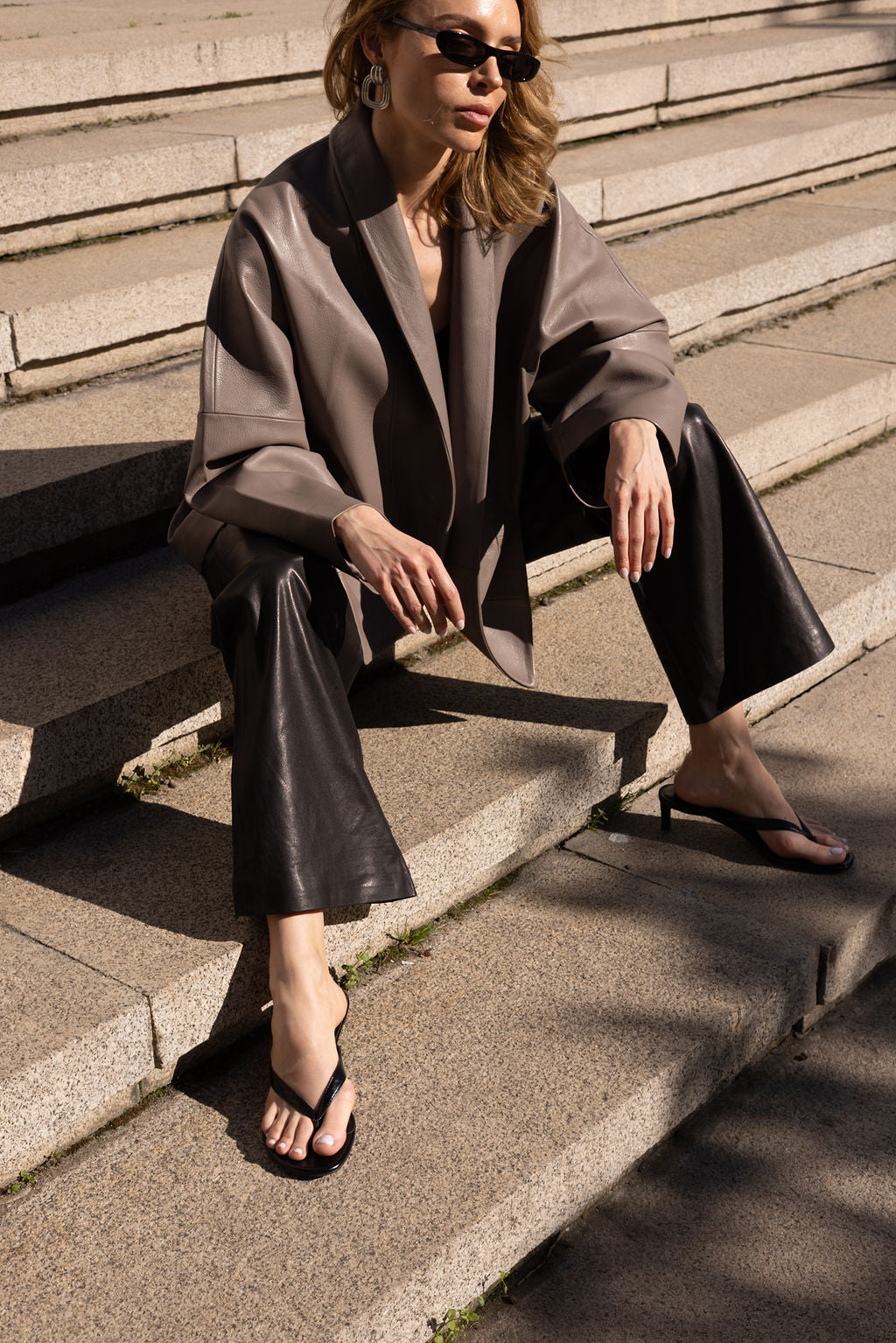 Black leather pants with clasp
