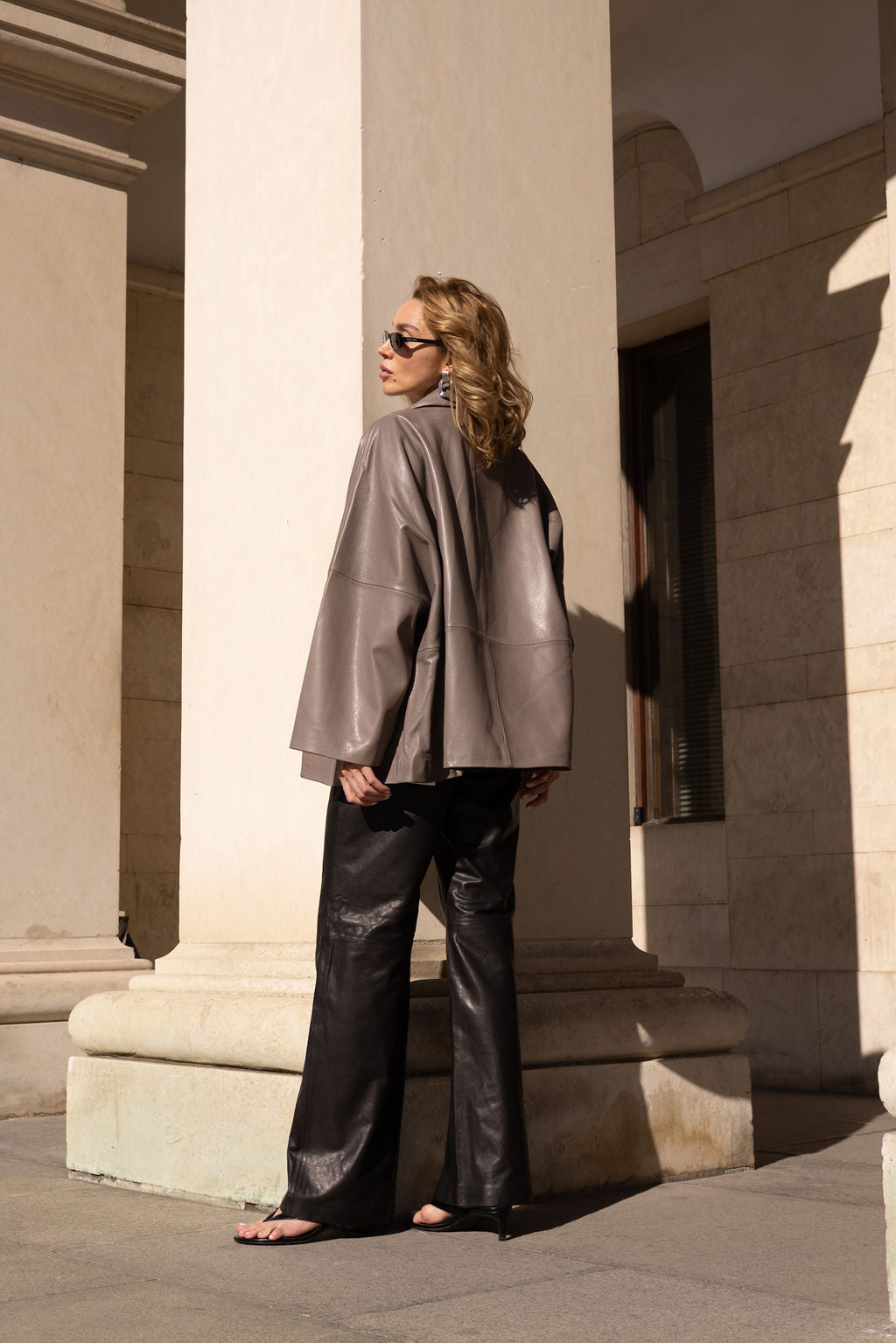 Black leather pants with clasp