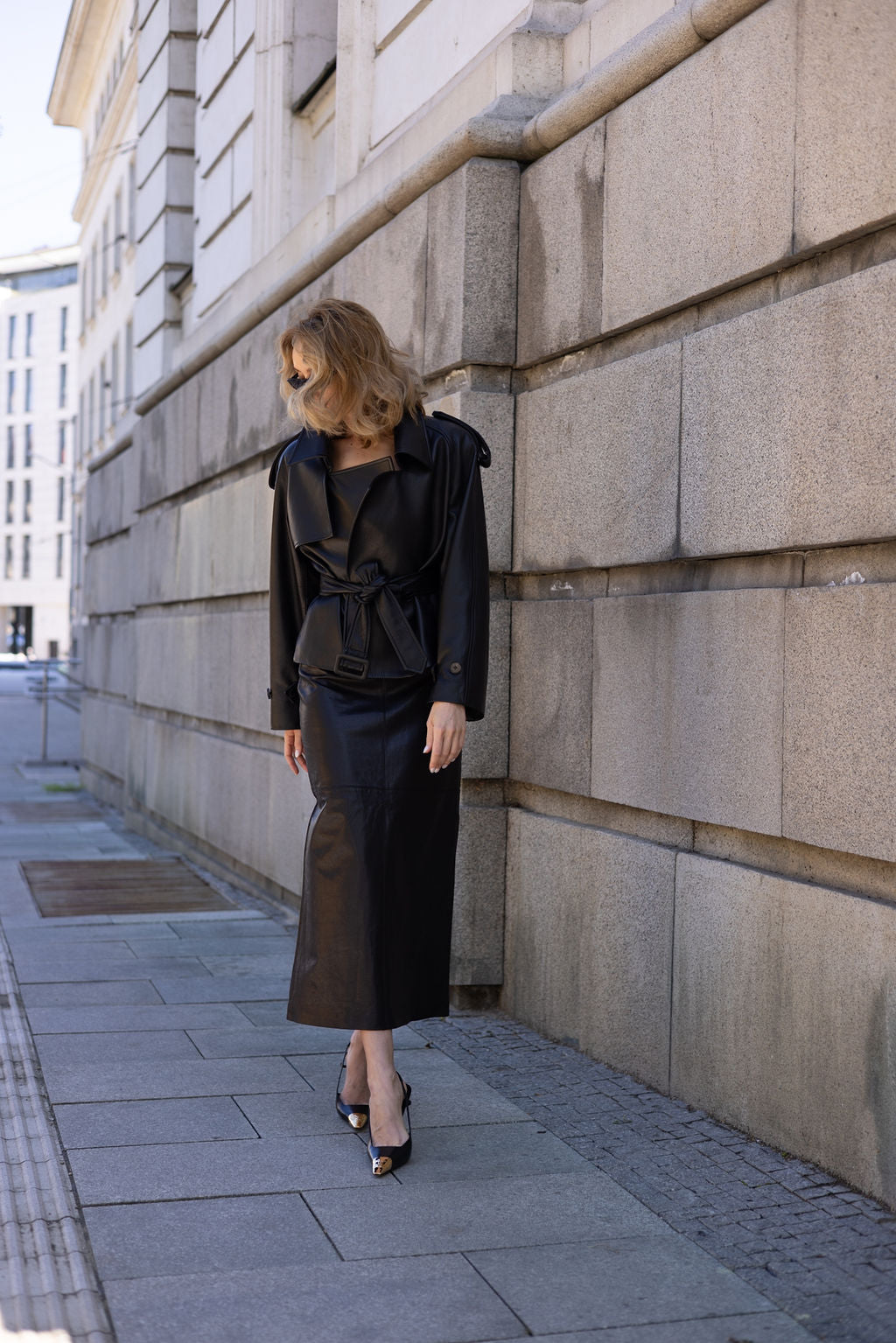 Black leather straight midi skirt